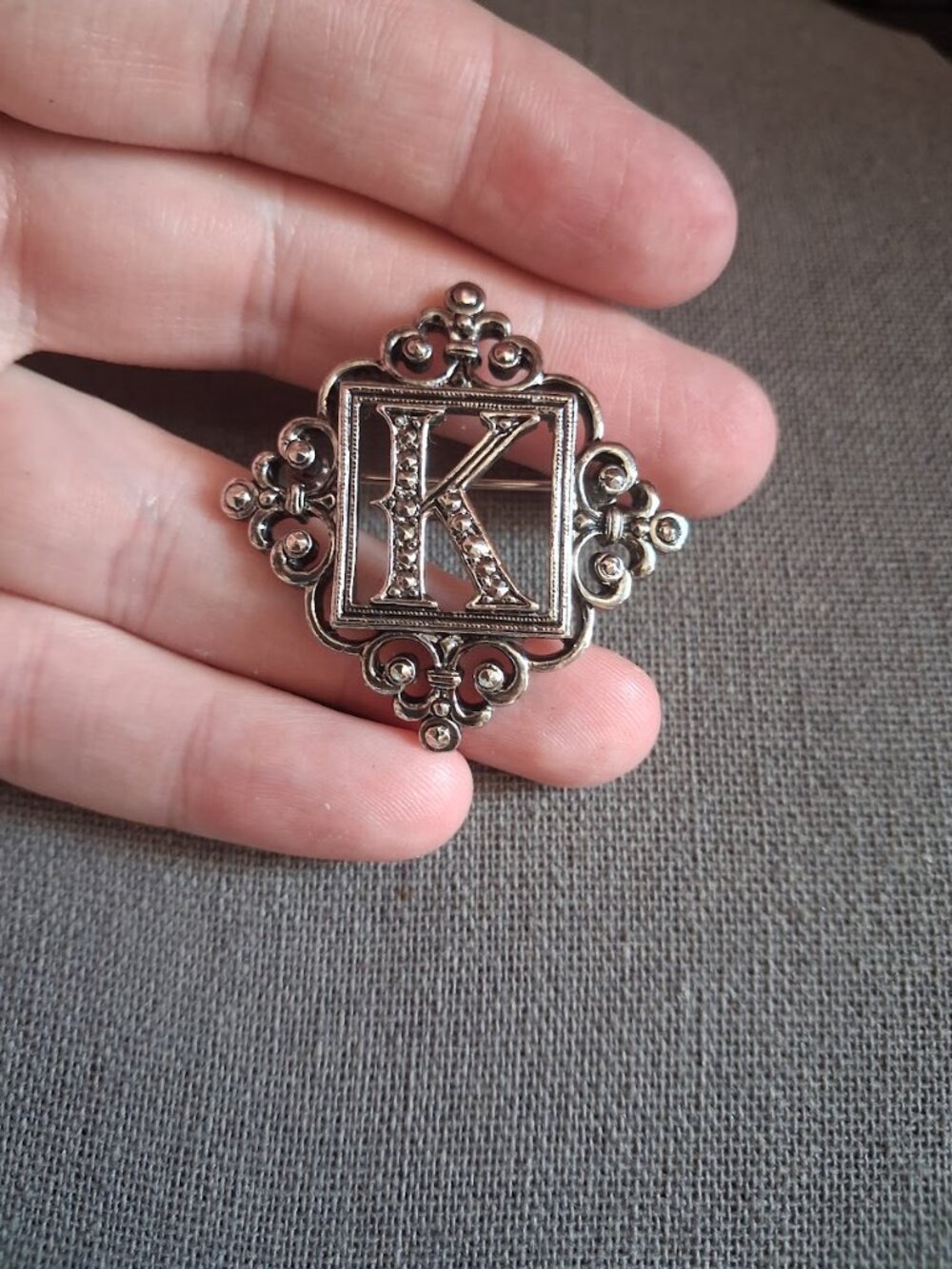 "K" intial brooch